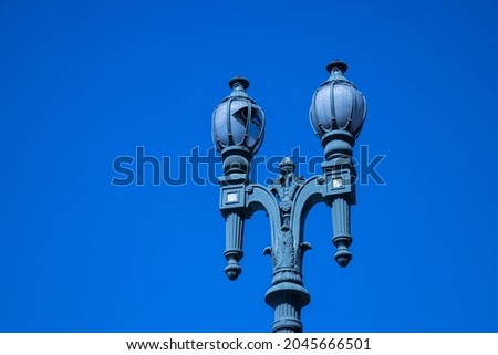 Antique street lights with blue sky . Lamp post. 