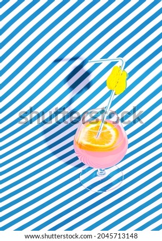 Summer cocktail on a striped background. Retro style