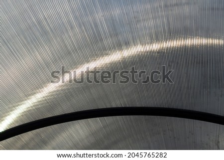 Texture made of plastic. A close-up of the tunnel design shooting. A plastic dome made of transparent material.
