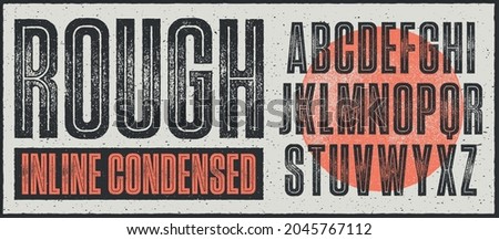 Rough Inline Condensed Font. Works well at small sizes. Detailed individually textured characters with an eroded rough letterpress print texture. Unique design font Royalty-Free Stock Photo #2045767112
