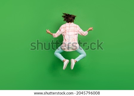 Full body back rear side spine view photo of young woman jump up yoga om sing asana meditate isolated on green color background