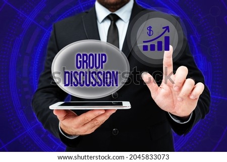 Conceptual caption Group Discussion. Conceptual photo gather either formally or informally to bring up ideas Man In Office Uniform Standing Pressing Virtual Button Holding Tablet.
