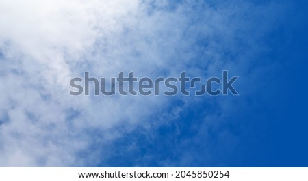 Blue sky background with white clouds. Panorama