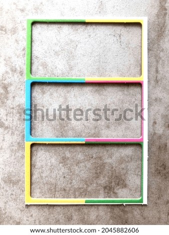 Three Empty frame for your text or information Design space  
Grey stone background and colorful frame 