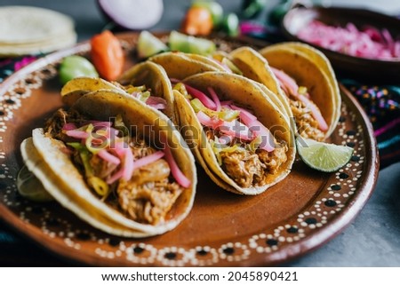 Mexican tacos of Cochinita Pibil , Mayan cuisine from Yucatan Mexico Royalty-Free Stock Photo #2045890421