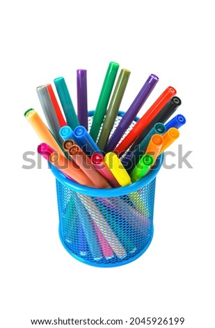 Holder with colorful markers on white background