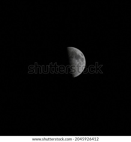 half moon photo in the dark night