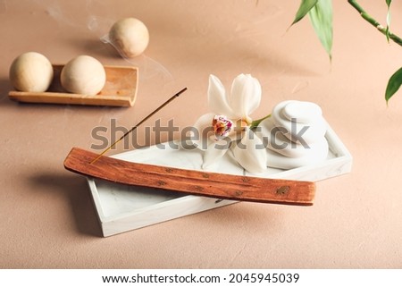 Beautiful spa composition with incense on table Royalty-Free Stock Photo #2045945039
