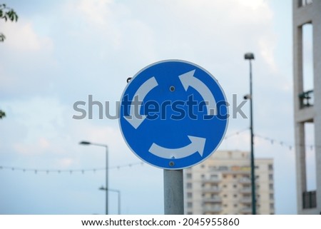 Traffic sign: "Roundabout" .Signs giving orders. Road signs in Israel
