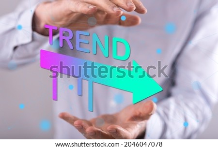 Trends concept between hands of a man in background