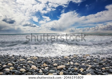Pebble beach on the sea