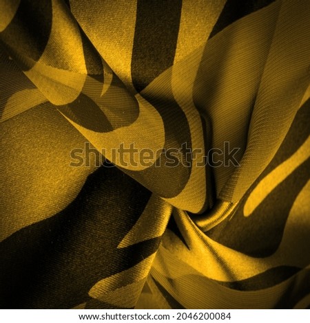 silk fabric in abstract yellow colors. Abstract watercolor paint, painted textured vertical silk fabric, canvas, macro, close-up. Texture. Background. Template.