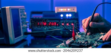 PCB witch microcontroller in electronics laboratory Royalty-Free Stock Photo #2046209237