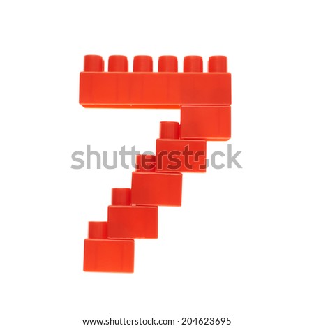 Number seven made of toy construction building bricks isolated over the white background
