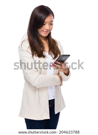 Asian woman look at cellphone