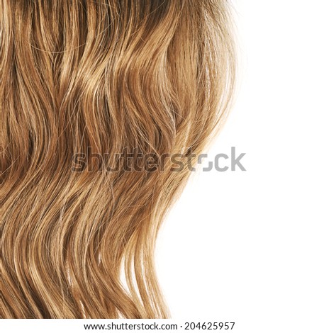 Wavy hair fragment placed over the white background as a copyspace backdrop composition