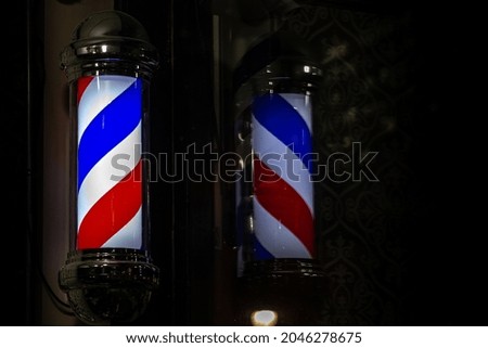 barber shop red and blue sign