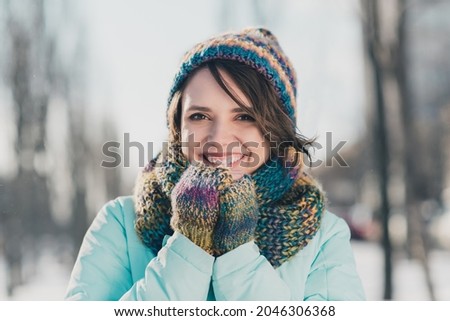 Photo of happy charming cheerful positive young woman cold outside smile good mood outdoors in park