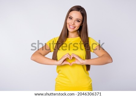 In love with sport Photo of slim fit shapes lady make heart figure fingers come training feel good wear yellow football uniform t-shirt isolated white color background