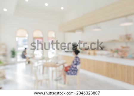 Coffee shop or cafe restaurant interior blur for background Royalty-Free Stock Photo #2046323807