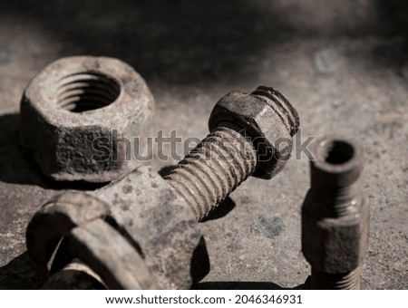 rusty nut. Rusty iron rod with screw threads. Rusted mechanical components. threaded bolt and nut isolated close up. dismantling concept, difficult to unscrew, non-removable. space for text