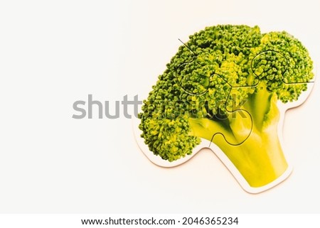 Broccoli on a white background. Picture of broccoli on a white background. Broccoli puzzle. 