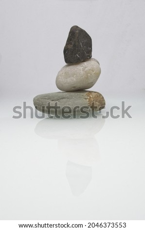 The zen like stone stack on white background