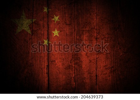 Chinese flag over a grunge background.