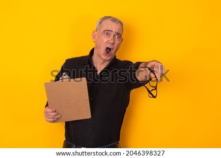 isolated businessman yelling and pointing