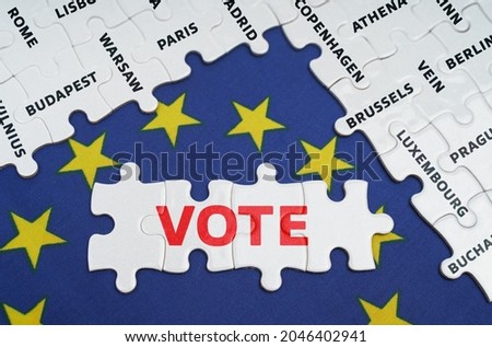 European Union concept. The EU flag has city name puzzles and puzzles with the words - Vote
