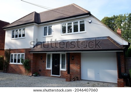 Large detached property with integrated garage in Chorleywood, Hertfordshire Royalty-Free Stock Photo #2046407060