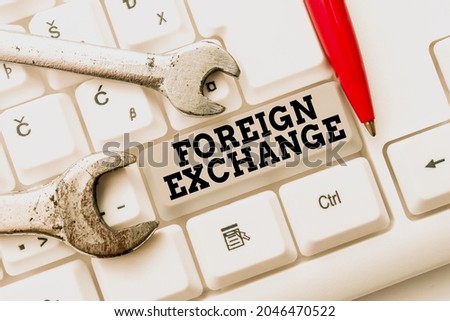 Text caption presenting Foreign Exchange. Conceptual photo system for dealing in the currency of other countries Abstract Programmer Typing Antivirus Codes, Retyping Debug Codes