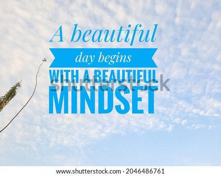 Inspiratinal motivating quote with nature background. A beatiful day begins with a beautiful mindset.