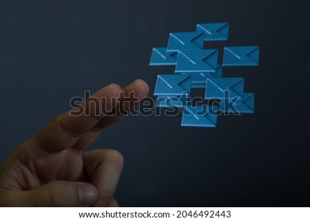 A 3D rendering of fingers pointing to email icons- online chat and messaging concept