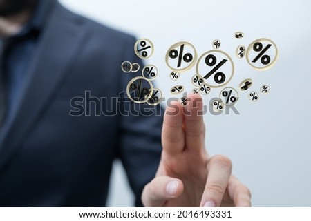 A 3D rendering of percent signs with a male touching it from the background- concept for blurred sale