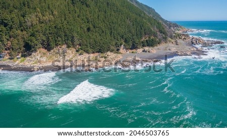 Caleta Pellines, Constitucion, Maule, Chile, horizontal drone aerial photo, sea, beach, hill and Forest, Chilean surf spot