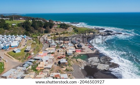 Caleta Pellines, Constitucion, Maule  CHILE Aerial view from drone horizontal photo of the sea, beach, city and fishermen's cove, side view
