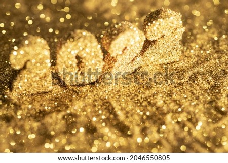 2022 letters shining with gold