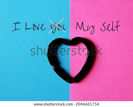 A heart on blue and pink background , with text I LOVE YOU (cross out you) MYSELF, concept of choose self-love over somebody else, self-esteem affirmation, mental health important than relationship