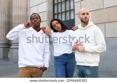 White simple apparel street style men and women's clothing outdoor shoot Royalty-Free Stock Photo #2046668381