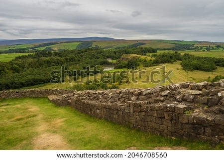 The Hadrian’s Wall Path is an 84 mile (135 km) long National Trail stretching coast to coast across northern England, from Wallsend, Newcastle upon Tyne Royalty-Free Stock Photo #2046708560