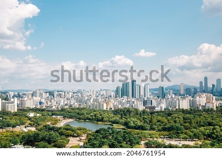 Panoramic view of Seoul city and green forest from Sky park in Korea Royalty-Free Stock Photo #2046761954