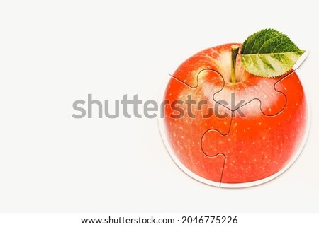 Apple on a white background. Red Apple. Picture of an apple. Apple puzzle.