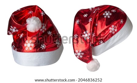 set of two Santa Claus red hat isolated on white background .Santa Claus hat with snowflakes that is for wearing on Christmas Day.beautiful hatn Santa