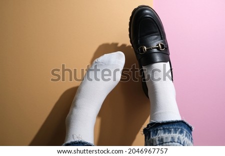 White socks. Mockup on a colored background.