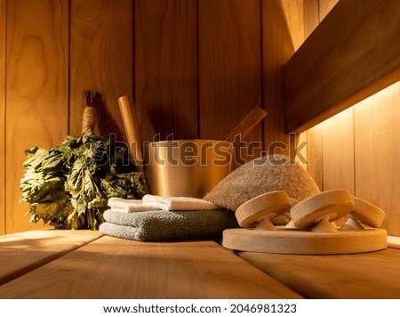 sauna accessories in the steam room Royalty-Free Stock Photo #2046981323