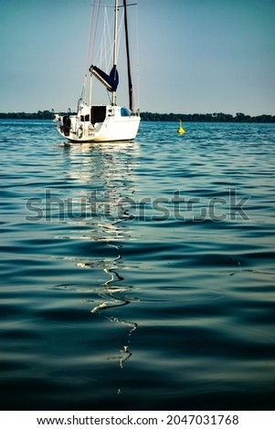 Sailboat moored in the harbor for boats, yachts and sailboats in a recreational destination