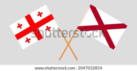 Crossed flags of Georgia and The State of Alabama. Official colors. Correct proportion
