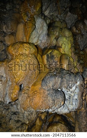 Colorful texture of stone in a cave. Rock texture wall inside a cave