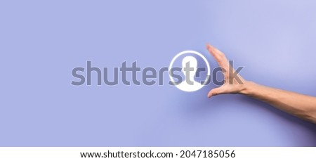 Businessman in suit holding out hand icon of user. Internet icons interface foreground. global network media concept,contact on virtual screens ,copy space. Royalty-Free Stock Photo #2047185056